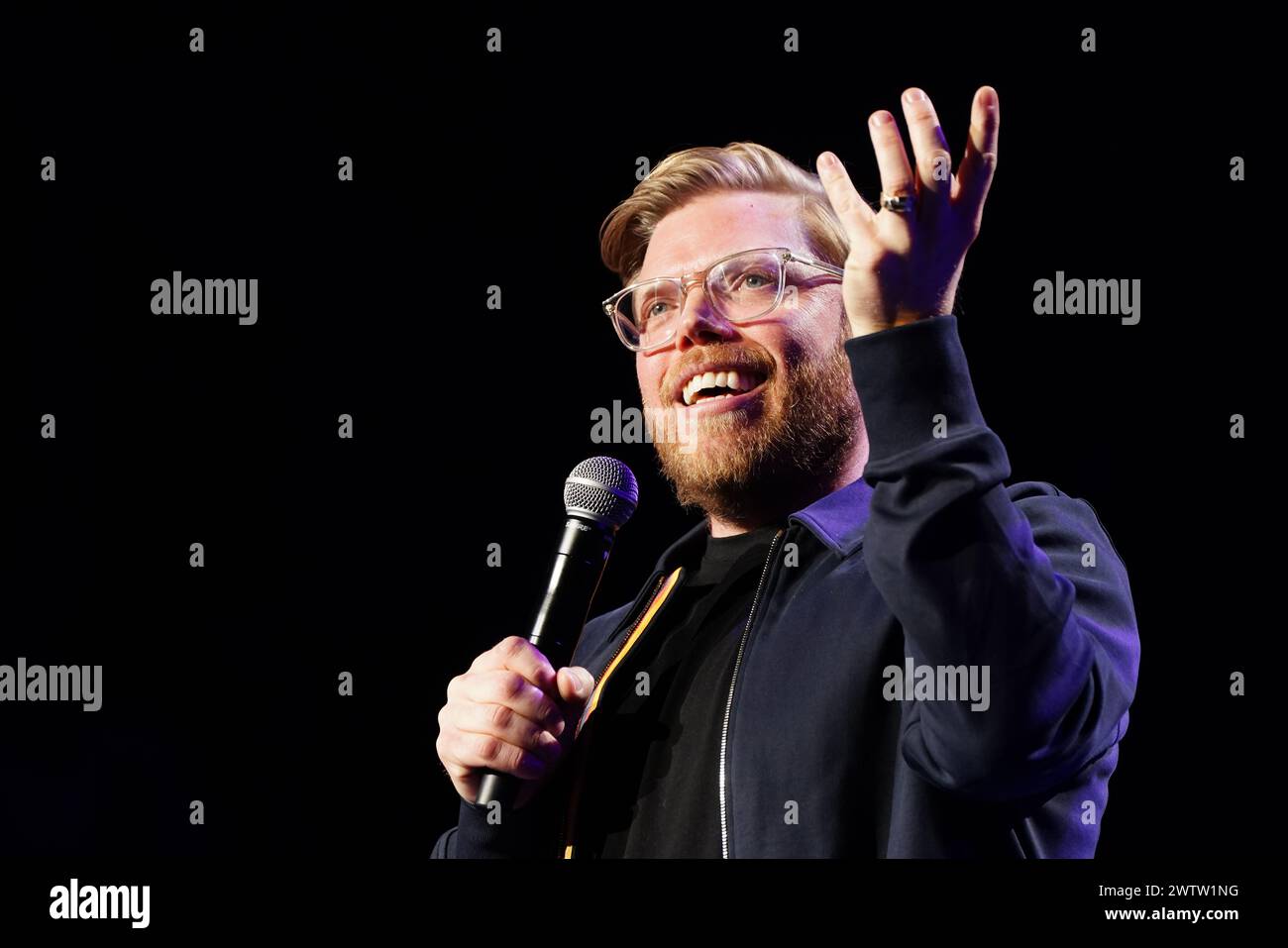 Rob Beckett on stage during A Night of Comedy, the Teenage Cancer Trust show at the Royal Albert Hall, London. Picture date: Tuesday March 19, 2024. Stock Photo