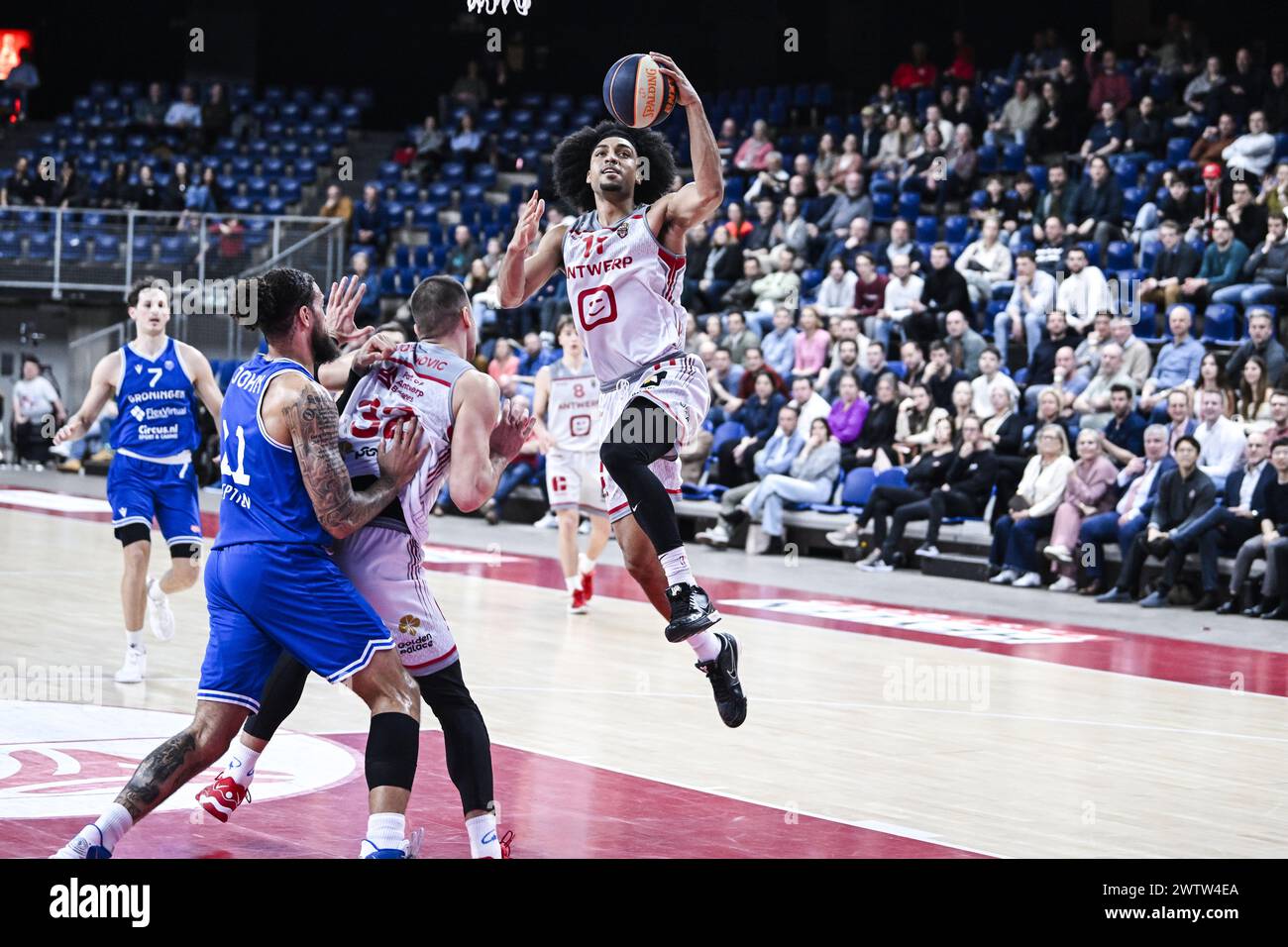 Antwerp, Belgium. 19th Mar, 2024. Groningen's Theo John, Antwerp's