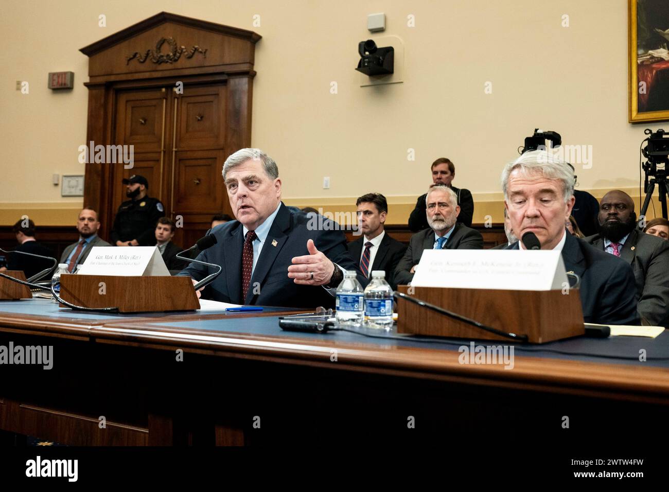 Washington, District Of Columbia, USA. 19th Mar, 2024. General MARK MILLEY (Retired), Former Chairman of the Joint Chiefs of Staff, with General KENNETH MCKENZIE Jr. (Retired), Former Commander of United States Central Command on the right, speaking at a hearing of the House Foreign Affairs Committee at the U.S. Capitol. (Credit Image: © Michael Brochstein/ZUMA Press Wire) EDITORIAL USAGE ONLY! Not for Commercial USAGE! Stock Photo