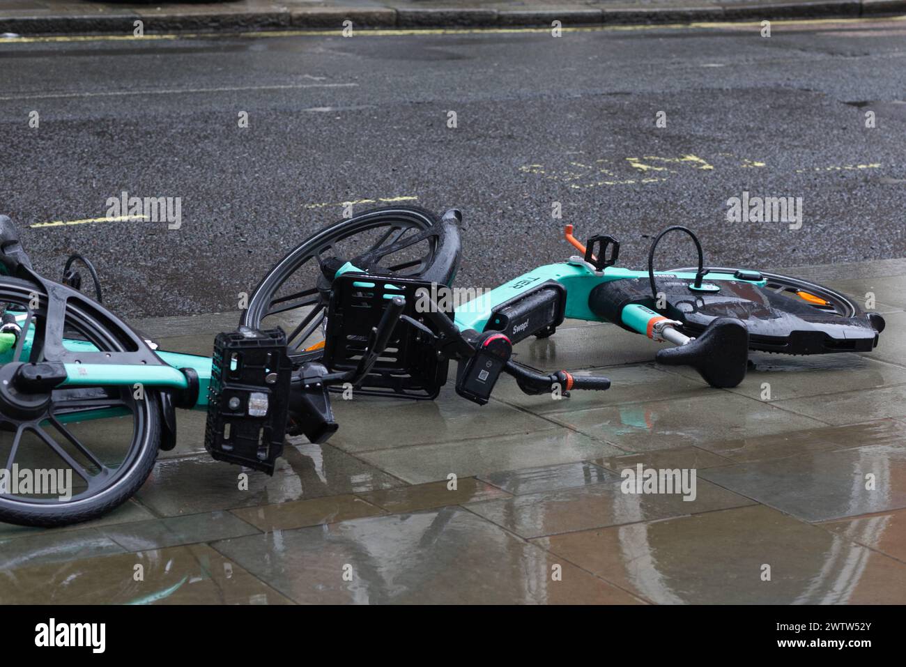 Discarded electric bikes on the streets of London Stock Photo