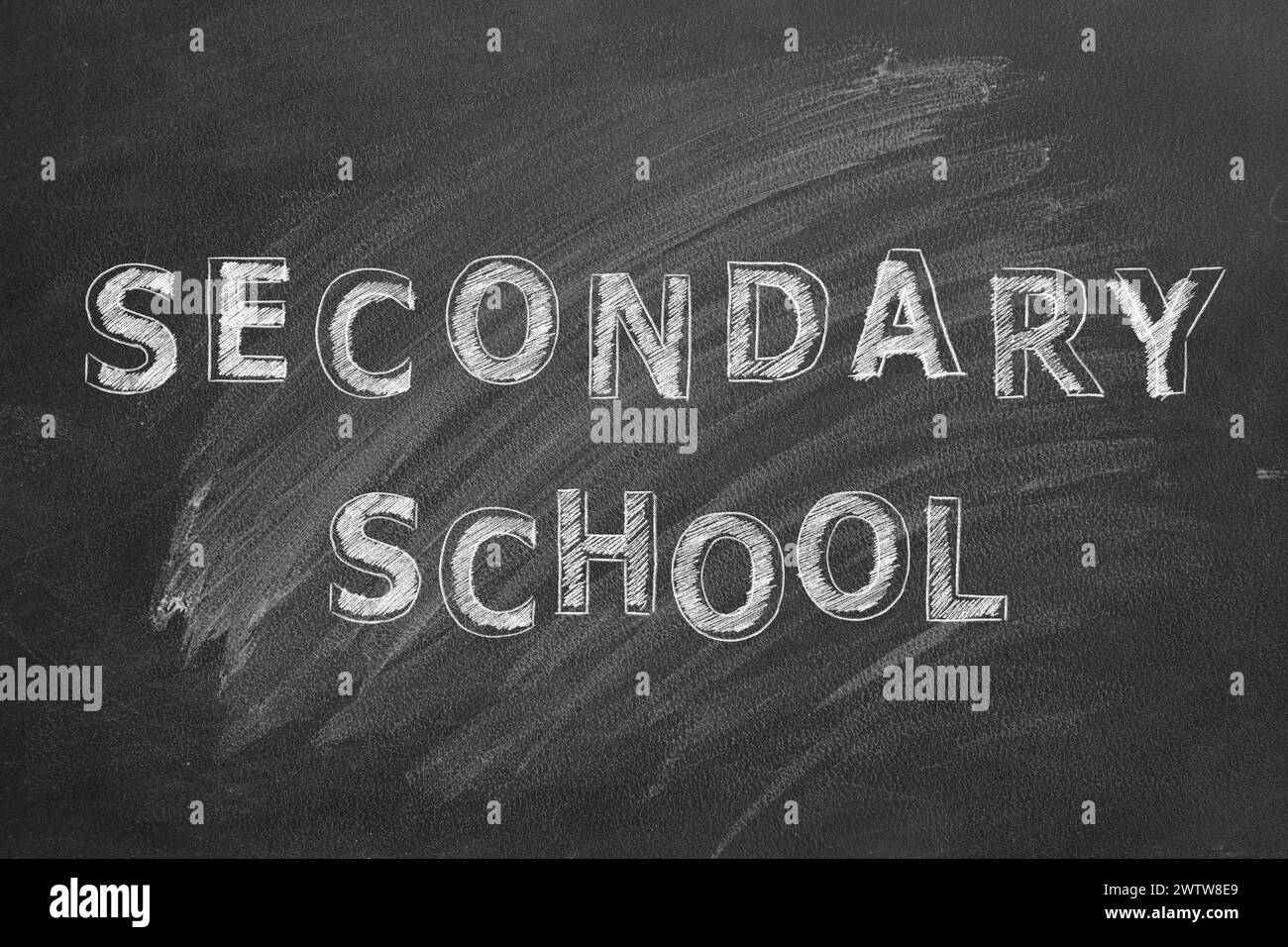 Hand drawing text Secondary school on black chalkboard. Stock Photo