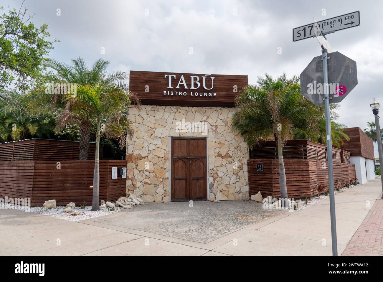 Stone and wood facade of the Tabu Bistro Lounge, a restaurant and nightclub in McAllen, Hidalgo County, Texas, USA. Stock Photo