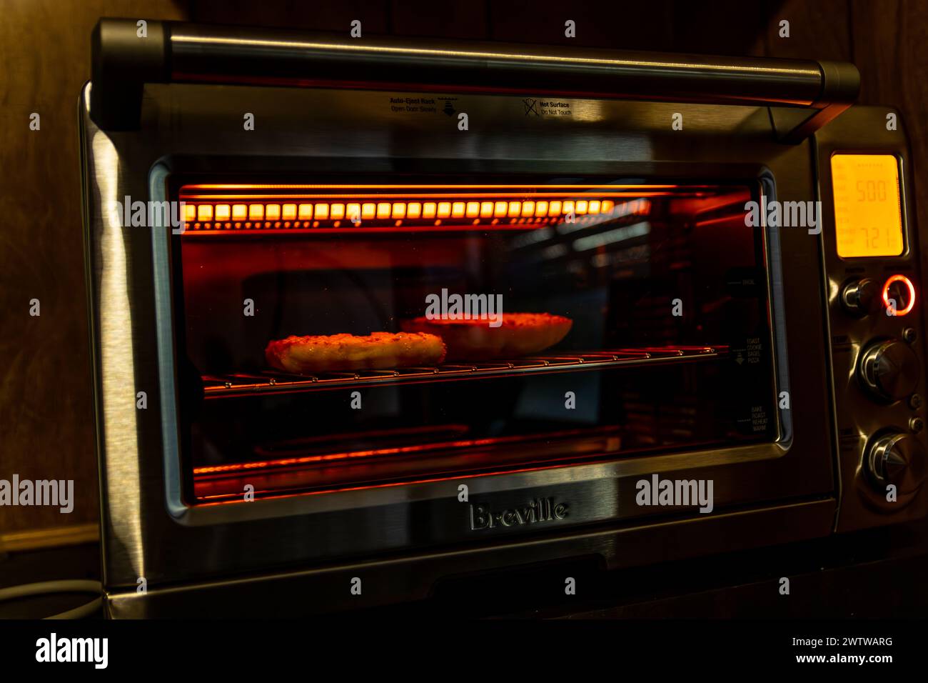 A Toaster Oven making garlic toast Stock Photo Alamy