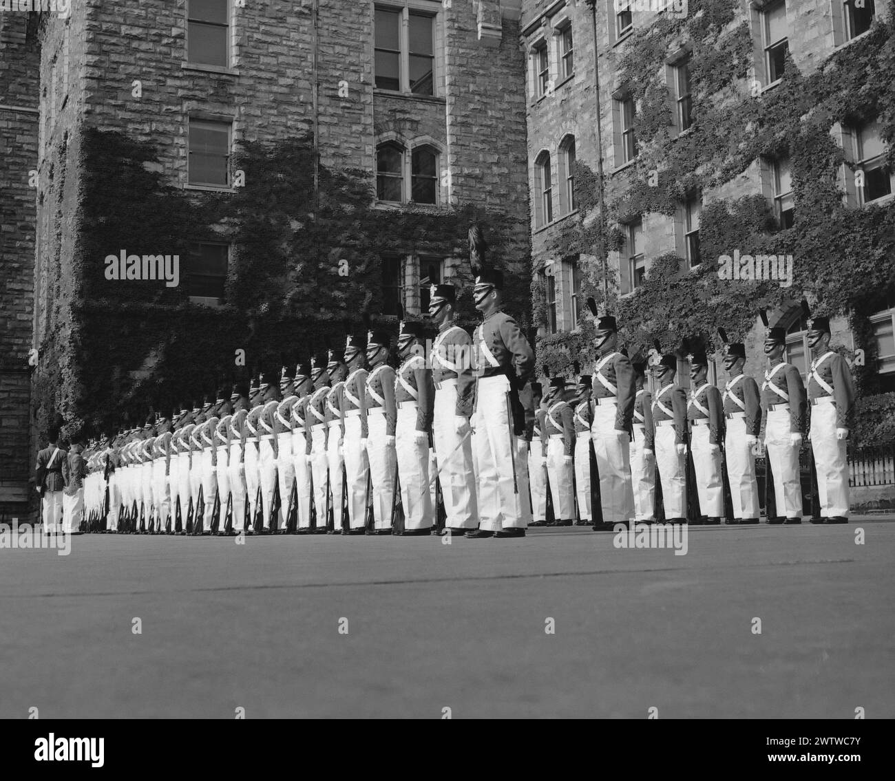 Rows of perfectly aligned cadets all wearing their formal uniform