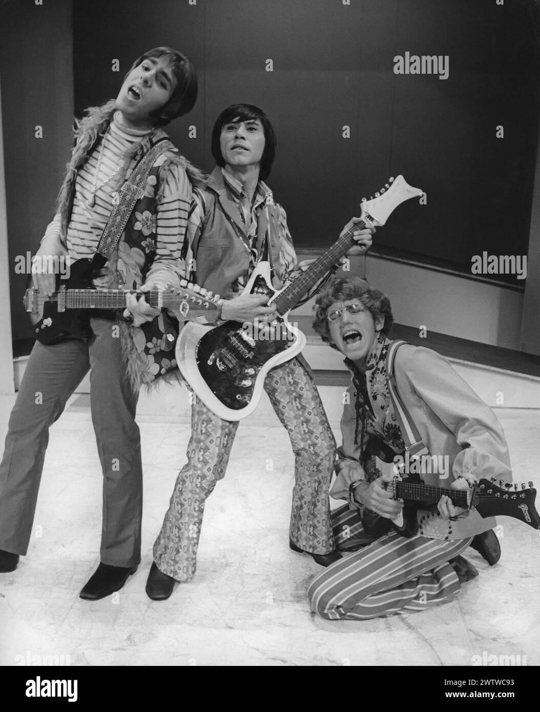 Promo shot of the rock group called The Apocalypse starring, Antony Travis, Danny Apolinar and John Kuhner performing their musical hit 'Your Own Thing', at the Huntington Hartford Theater. The guys are dressed in wild looking clothes including bell bottoms, stripes, plaids and fur Stock Photo
