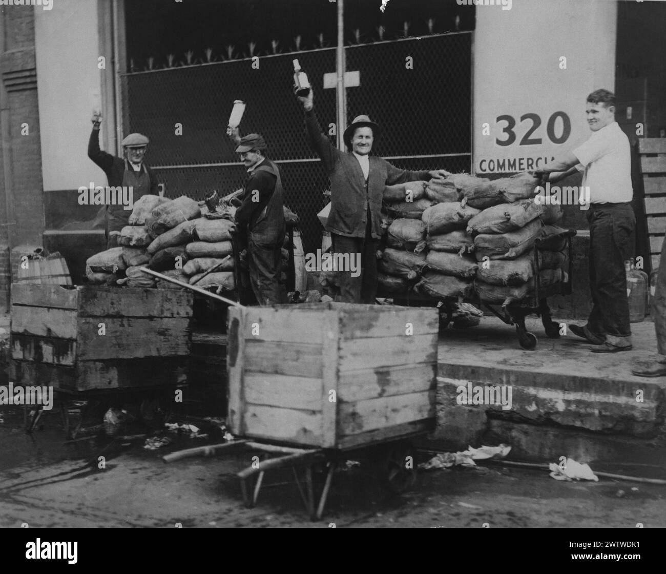Cargo of Scotch whiskey valued at more than $18,000 dollars is destroyed by federal prohibition agents in Los Angeles, CA Stock Photo
