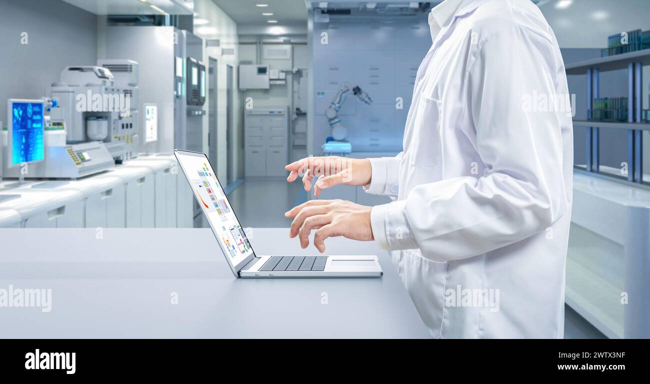 Worker or scientist wears lab coat work in laboratory Stock Photo