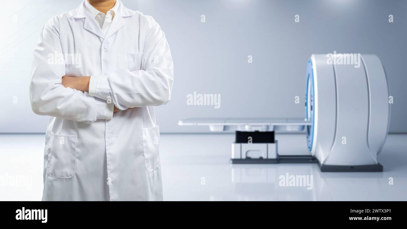 Doctor with mri scanner machine in hospital room Stock Photo