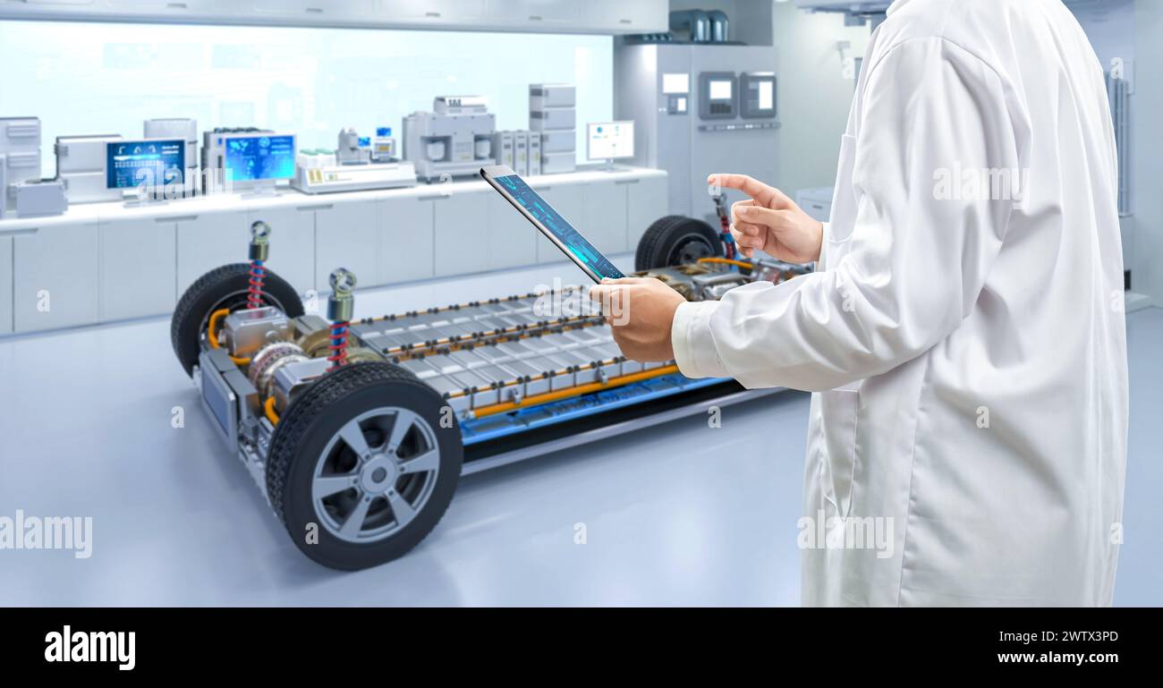 Asian engineer or technician work with ev car battery cells module in laboratory Stock Photo