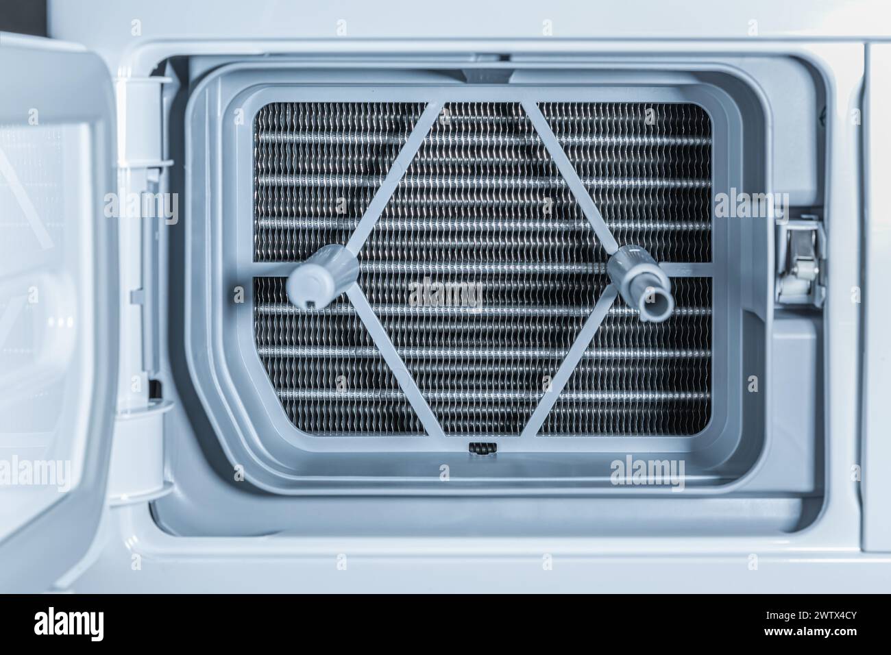 Detail of Heat pump dryer with heat exchanger and plinth filter Stock Photo