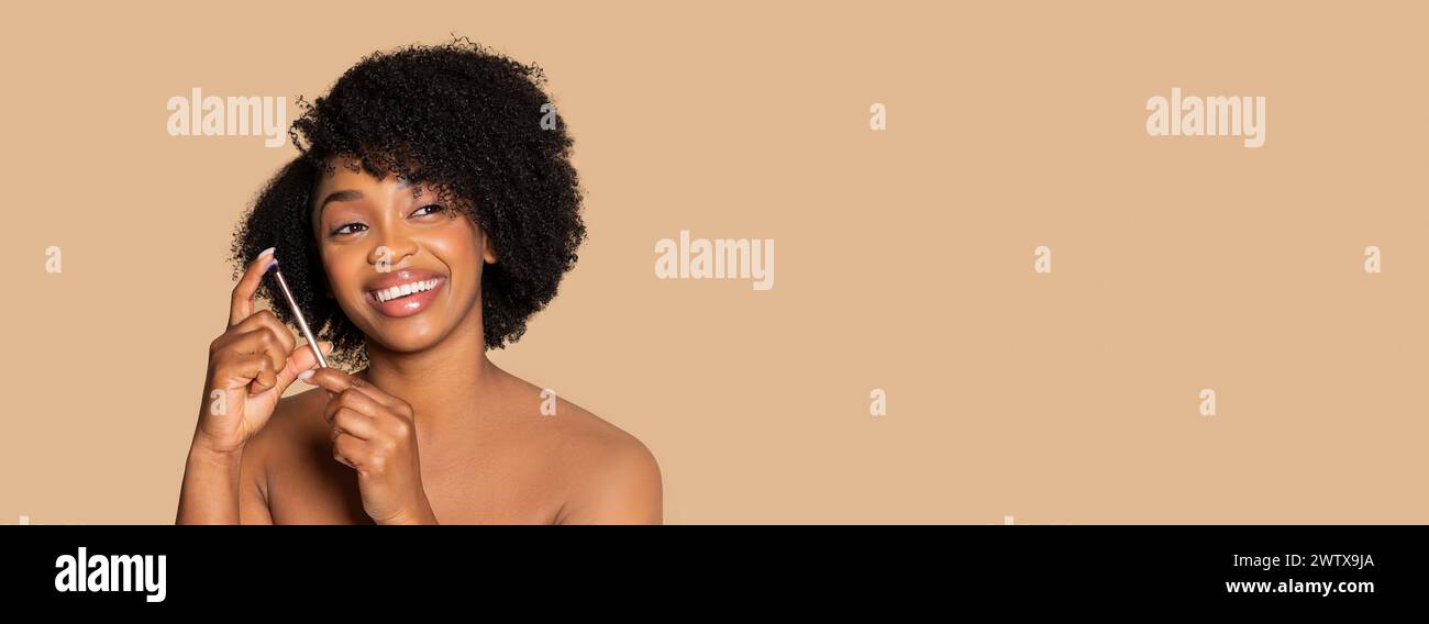 Happy black woman natural hair hi-res stock photography and images - Alamy