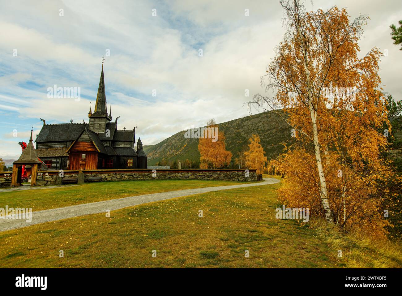 Timeless beauty standing tall amidst Norway's serene landscapes. ?⛰️ #NorwegianHistory #OldChurchCharm Stock Photo