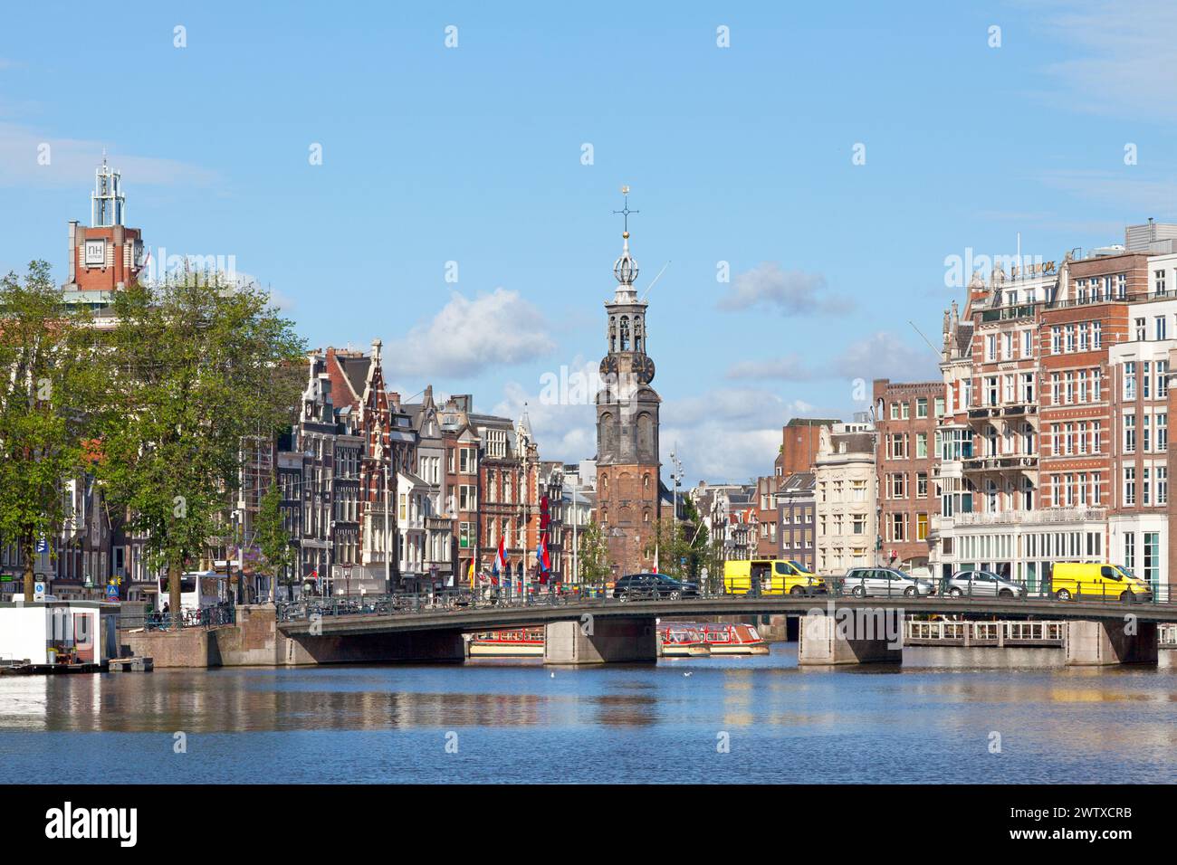 Amsterdam, Netherlands - July 02 2019: The Munttoren ('Mint Tower') or Munt is a tower standing on the busy Muntplein square, where the Amstel river a Stock Photo
