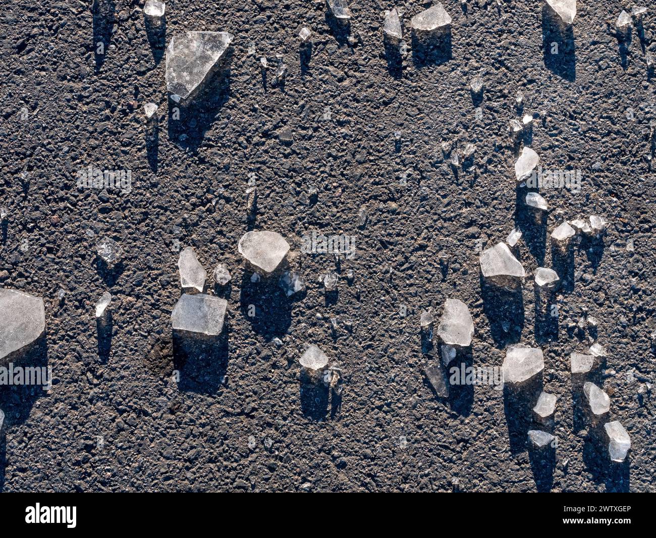 blocks of ice on the asphalt Stock Photo