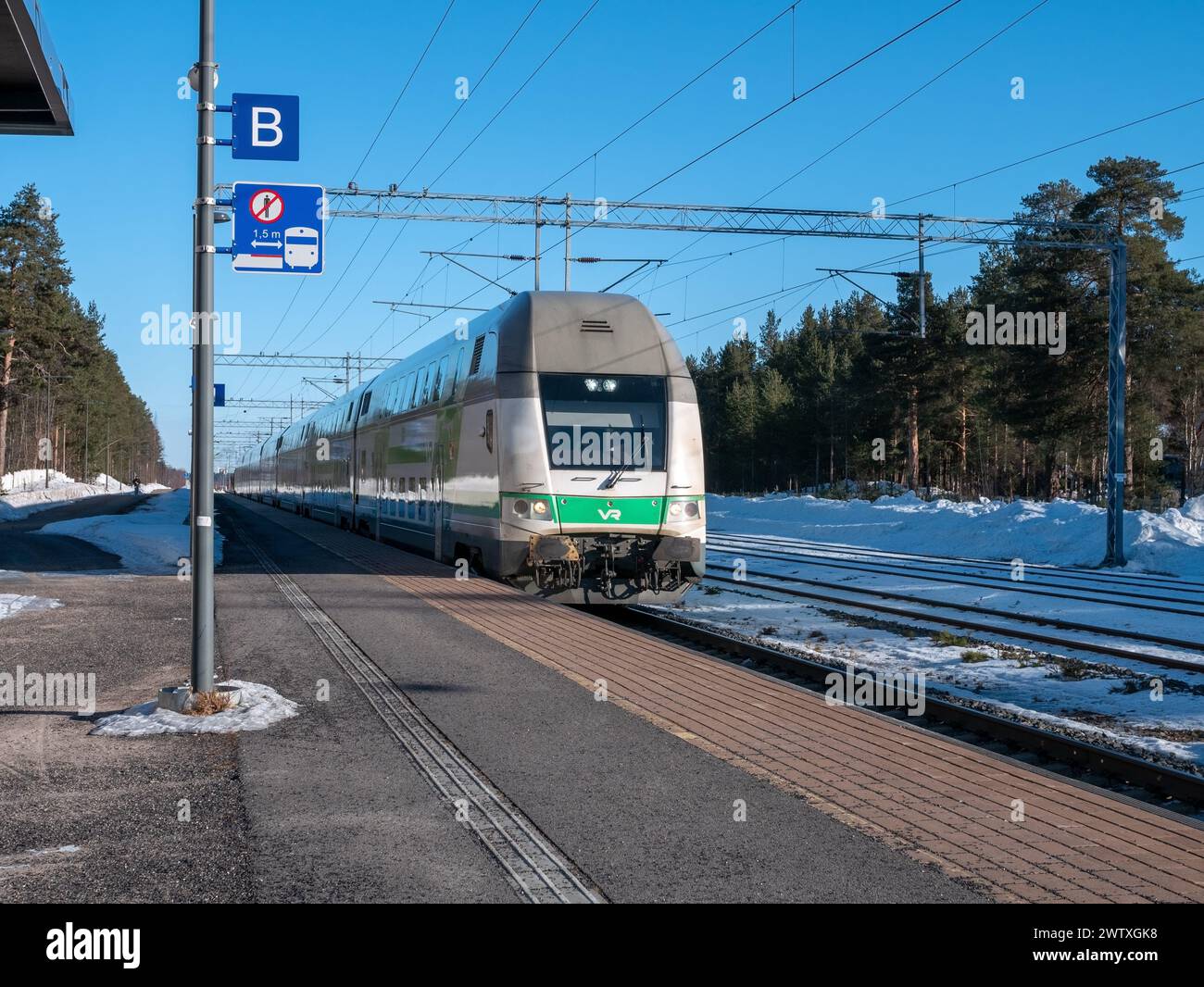 Pendolino train arriving at Kempele station, Finland Stock Photo