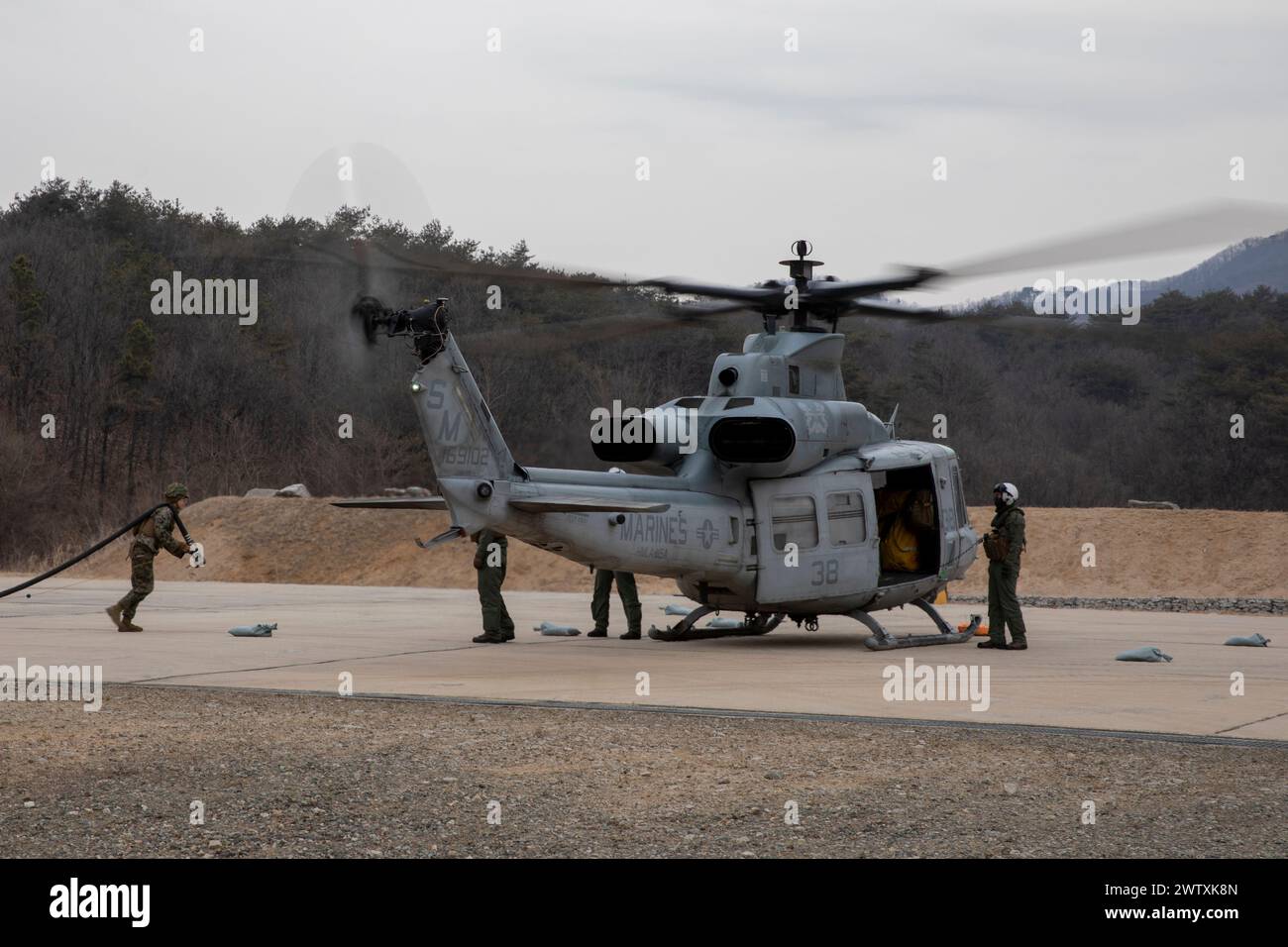 U.S. Marines with Marine Wing Support Squadron 172, Marine Aircraft Group 36, 1st Marine Aircraft Wing and Marine Light Attack Helicopter Squadron 369 Stock Photo