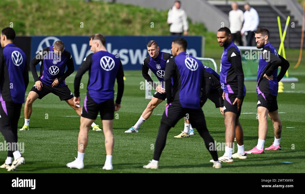 German National team perform stretching exercises during a training ...