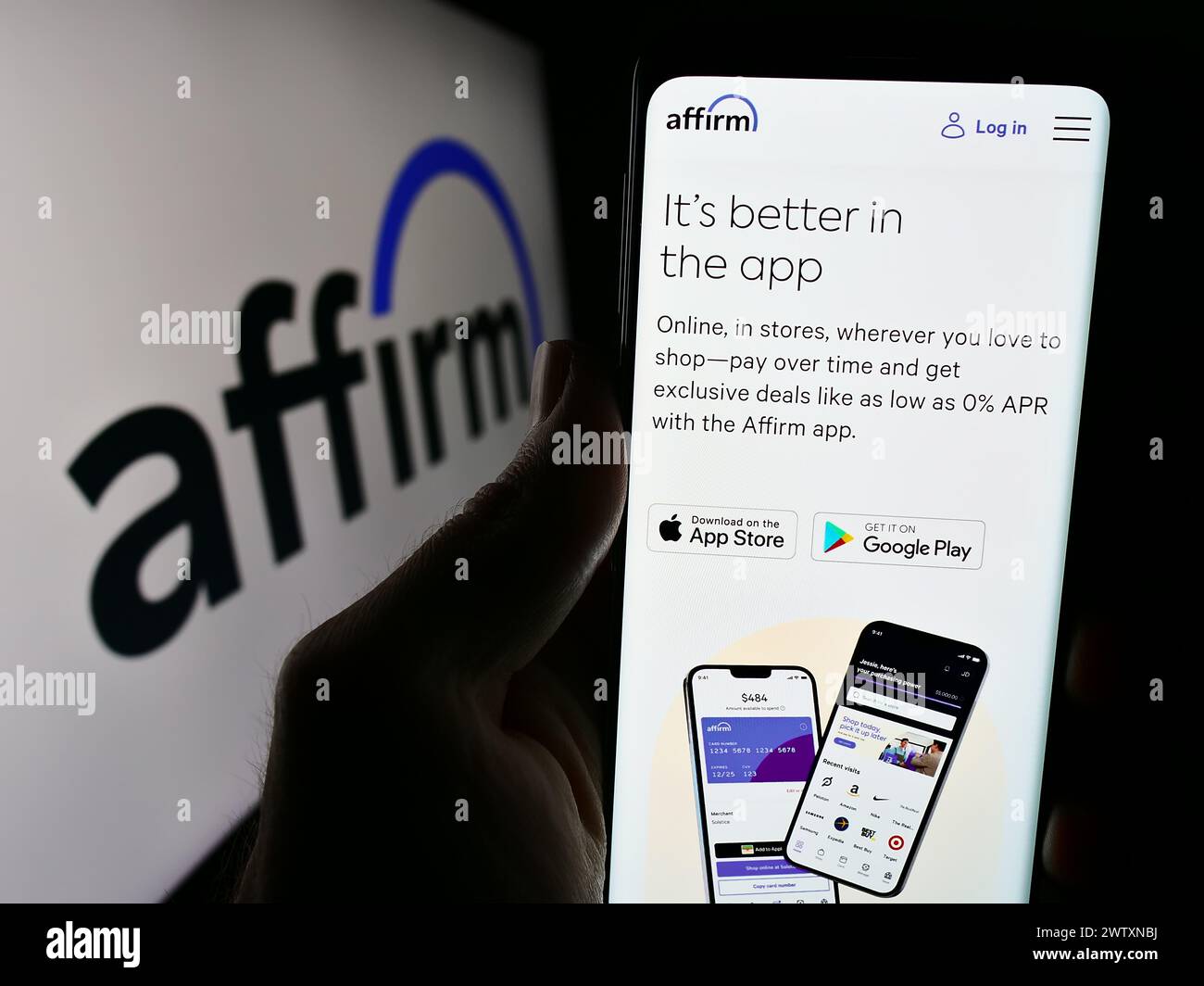 Person holding cellphone with webpage of US fintech company Affirm