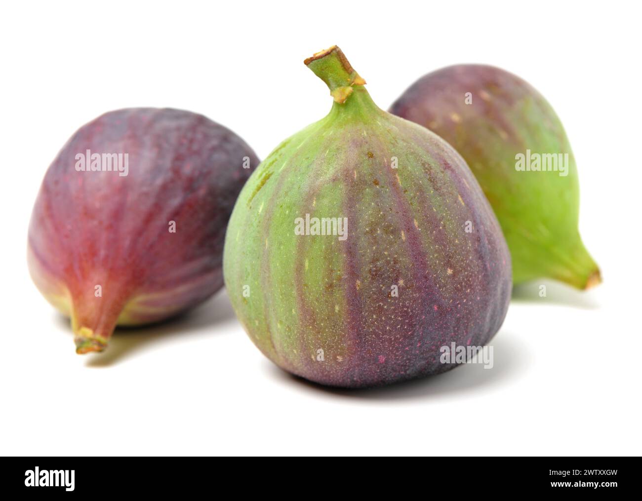 3 Ripe Figs Ripe figs on a white background Stock Photo - Alamy