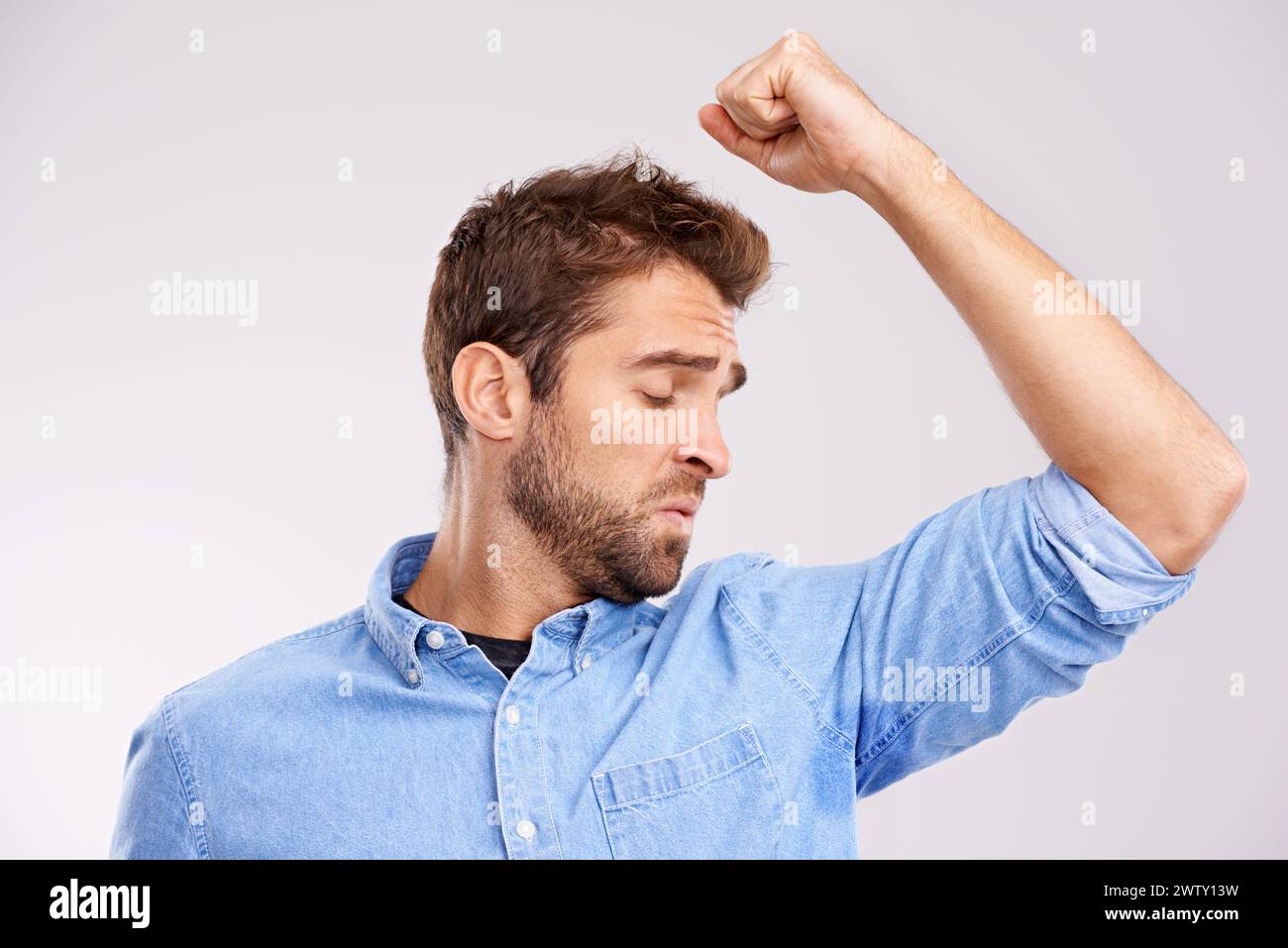 Man, smell armpit and sweat stain, bad hygiene or body odor with stink