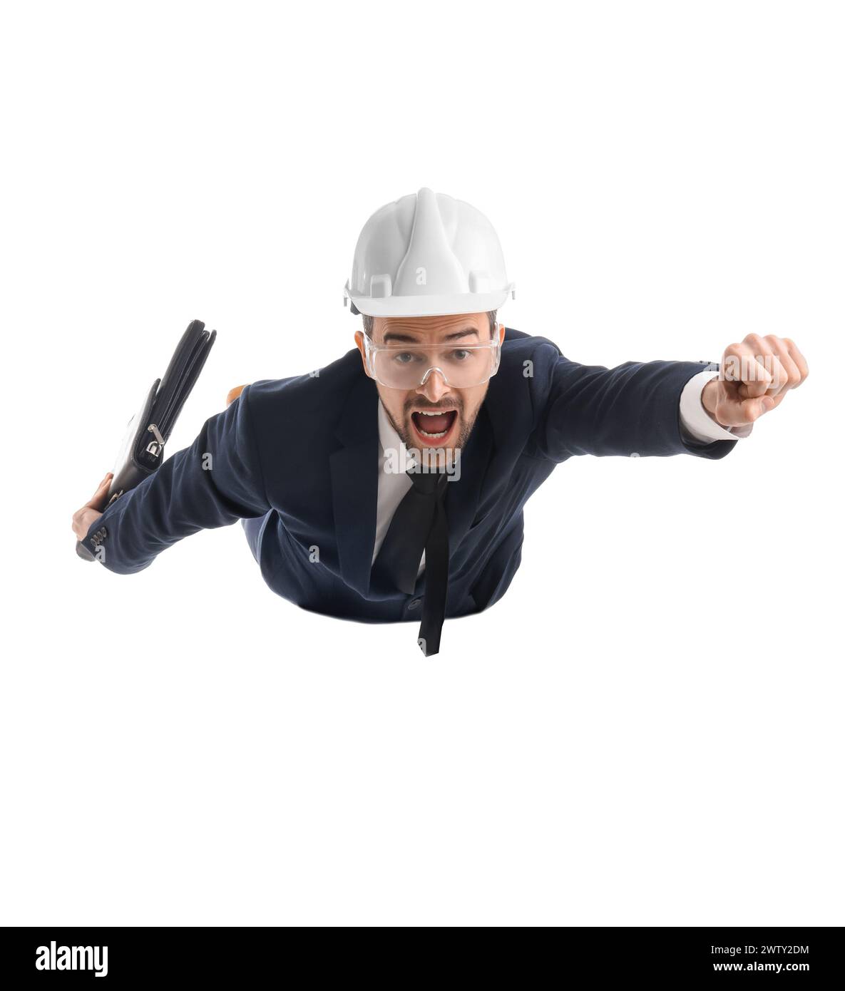 Funny businessman in helmet with briefcase lying on white background Stock Photo