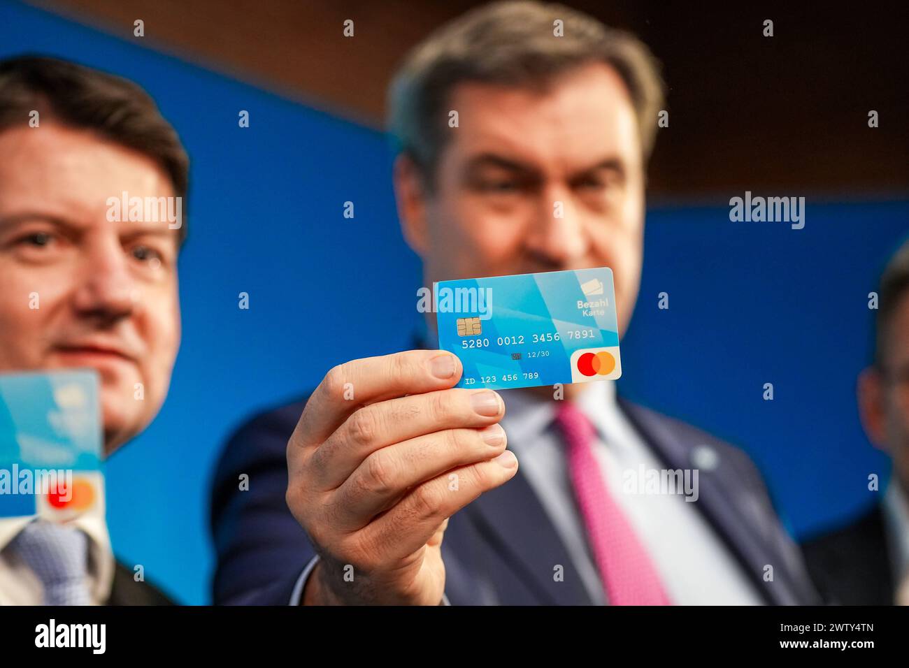 Munich, Bavaria, Germany - 20 March 2024: Prime Minister of Bavaria Dr. Markus Söder CSU presents the Bavarian payment card for asylum seekers at a press conference in Munich *** Ministerpräsident von Bayern Dr. Markus Söder CSU präsentier auf einer Pressekonferenz in München die bayerische Bezahlkarte für Asylbewerber Stock Photo