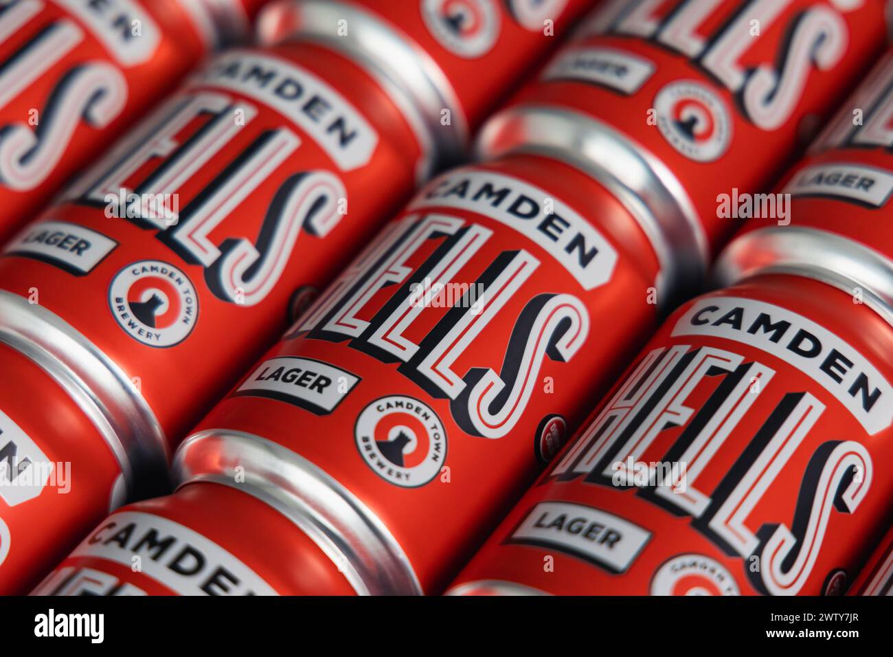 LONDON - MARCH 20, 2024: Camden Hells craft beer lager drink in red can tins Stock Photo
