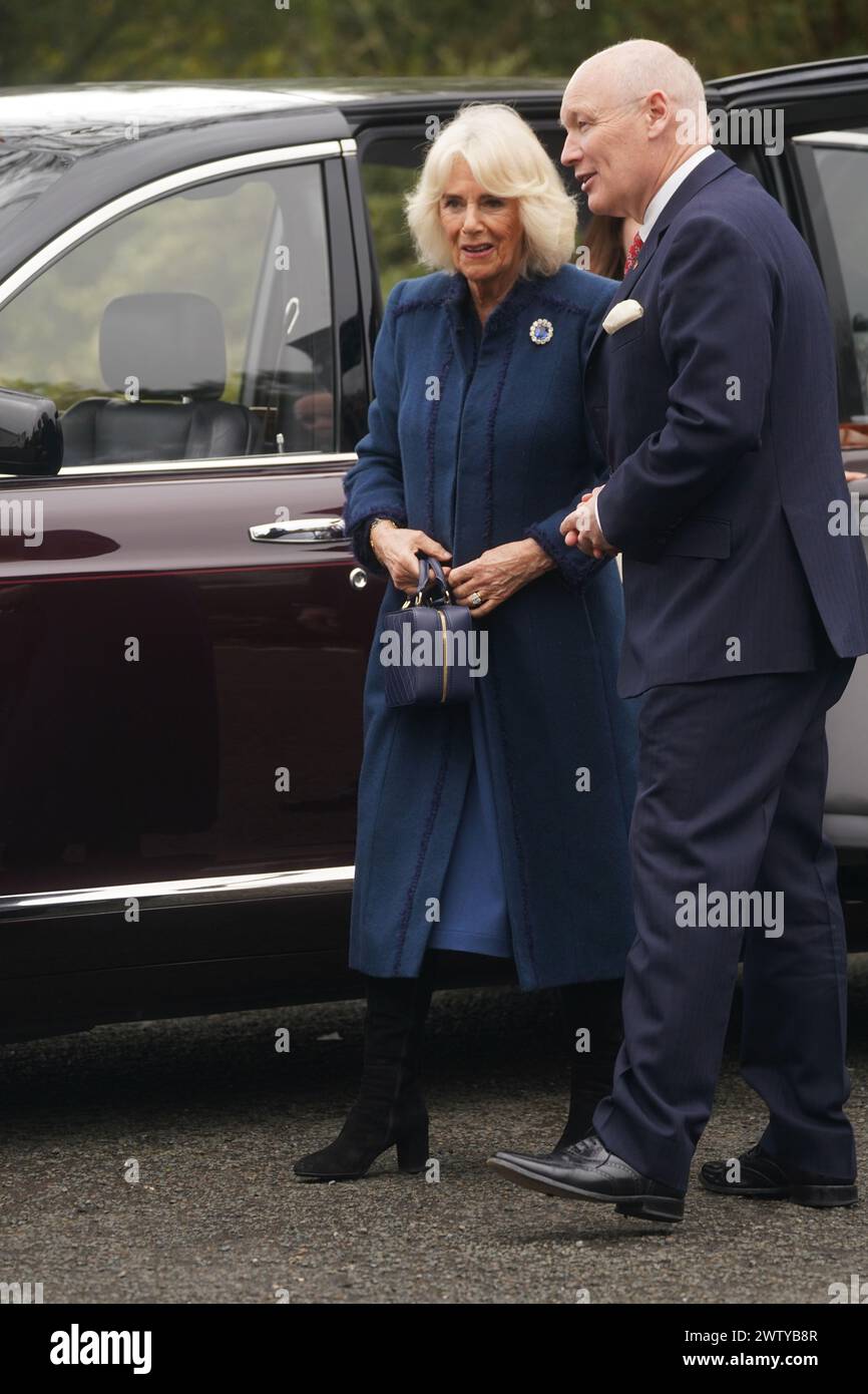 Queen Camilla is welcomed by Chief Minister, The Honourable Alfred Cannan to Government House, in Onchan, Isle of Man, where she is meeting community groups, and representatives from the RNLI and the Manx Bluetits swimming club. Picture date: Wednesday March 20, 2024. Stock Photo