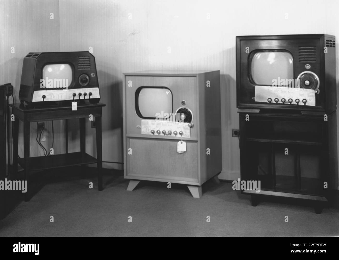 Three old-fashioned TV console sets Stock Photo - Alamy