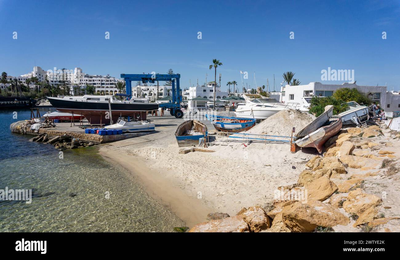 Small boats at boatyard at Marina in Port El Kantaoui, Tunisia on 18 March 2024 Stock Photo