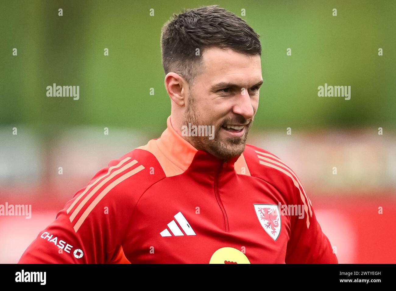 Aaron Ramsey of Wales during warms up ahead of the Wales open training session at Vale Resort Training complex, Hensol, United Kingdom, 20th March 2024  (Photo by Craig Thomas/News Images) Stock Photo