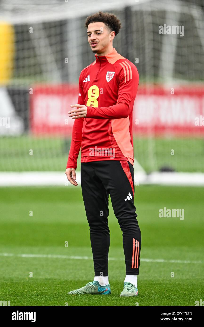 Ethan Ampadu of Wales during warms up ahead of the Wales open training session at Vale Resort Training complex, Hensol, United Kingdom, 20th March 2024  (Photo by Craig Thomas/News Images) Stock Photo