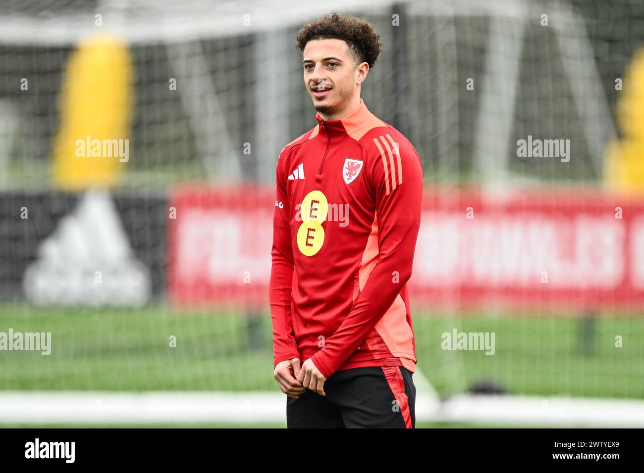 Ethan Ampadu of Wales during warms up ahead of the Wales open training session at Vale Resort Training complex, Hensol, United Kingdom, 20th March 2024  (Photo by Craig Thomas/News Images) Stock Photo