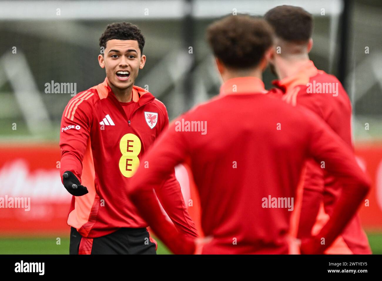 Brennan Johnson of Wales gives his team instructions during the Wales open training session at Vale Resort Training complex, Hensol, United Kingdom, 20th March 2024  (Photo by Craig Thomas/News Images) Stock Photo