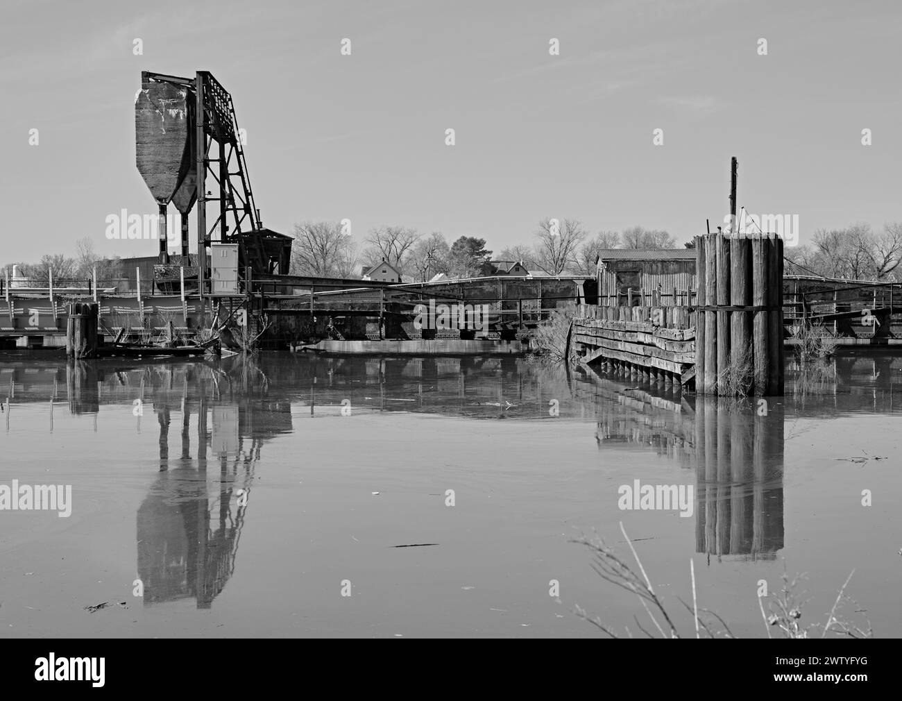 An old bascule railroad bridge,also known as a drawbridge. Over Overpeck Creek in N.J.entrance to the Hackensack River. In Black and White. Stock Photo
