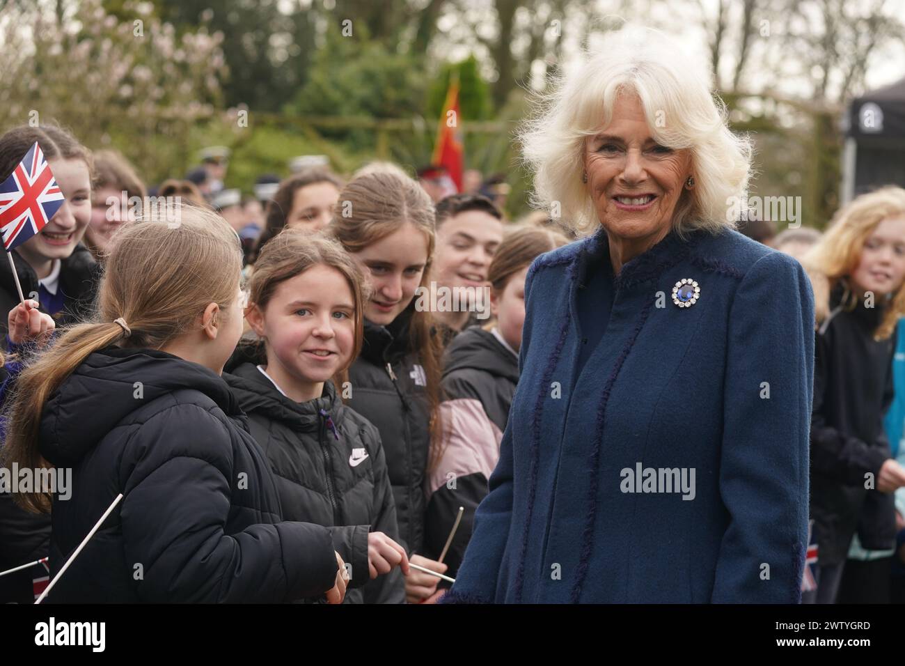 Queen Camilla during a visit to Government House, in Onchan, Isle of Man, where she is meeting community groups, and representatives from the RNLI and the Manx Bluetits swimming club. Picture date: Wednesday March 20, 2024. Stock Photo