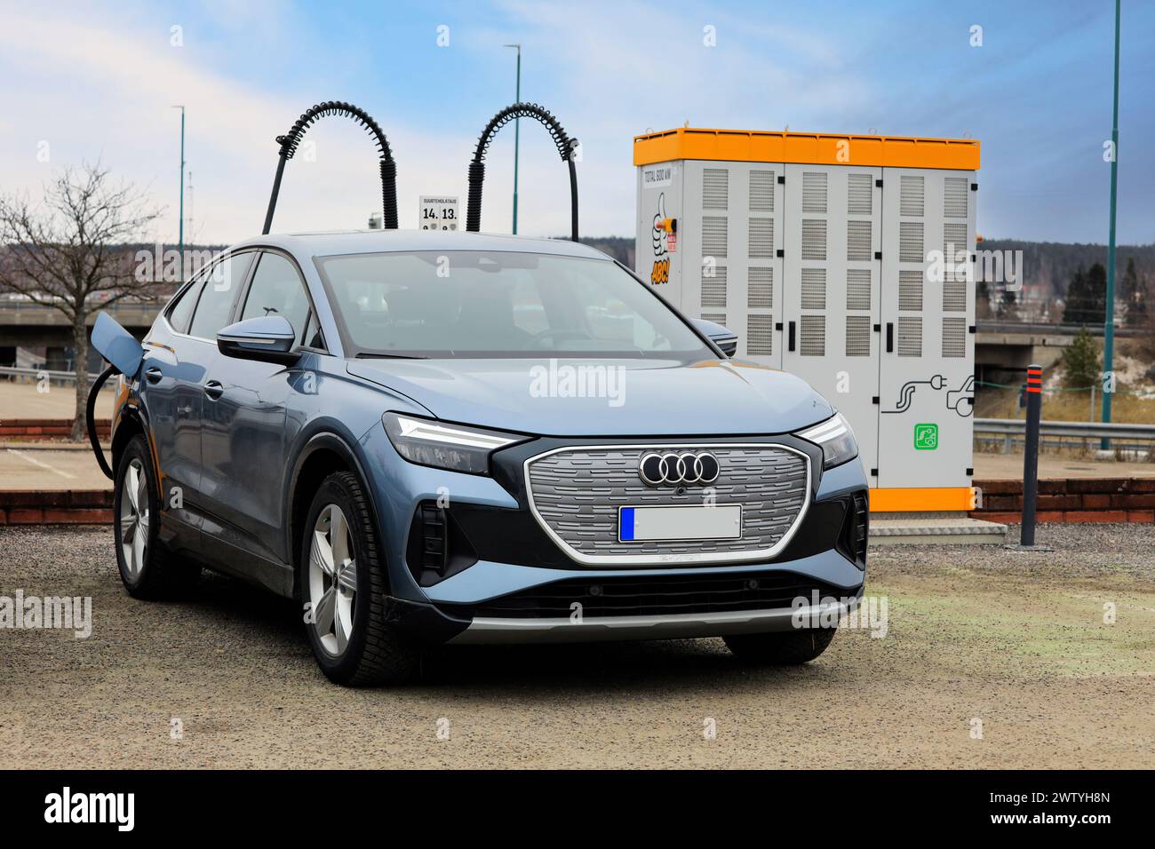 Ice blue Audi Q4 Sportback 40 etron fully electric car charging