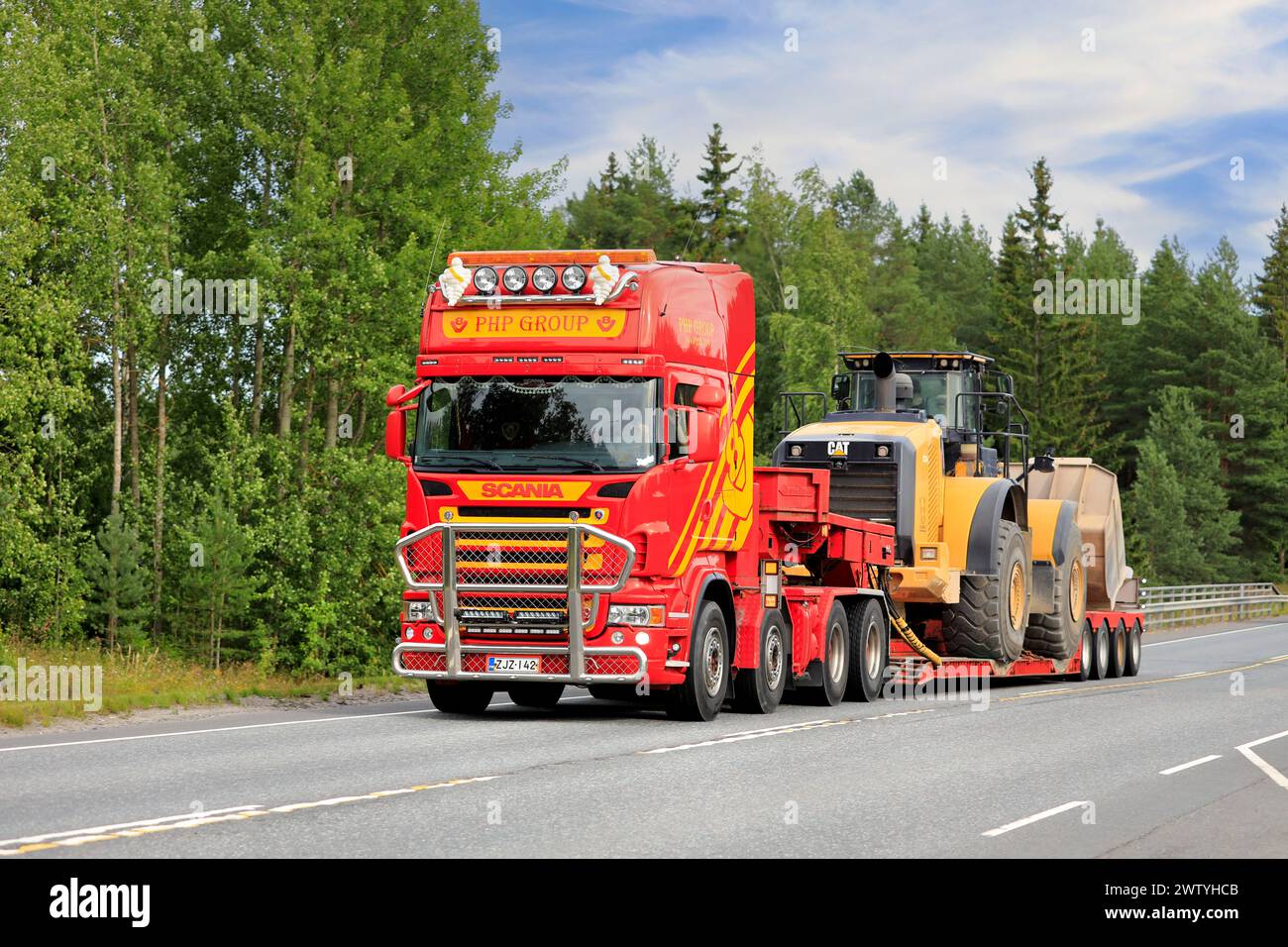 Customised Scania truck of PHP Group transports Cat 980K wheel loader Customised Scania truck of PHP Group transports Cat 980K wheel loader