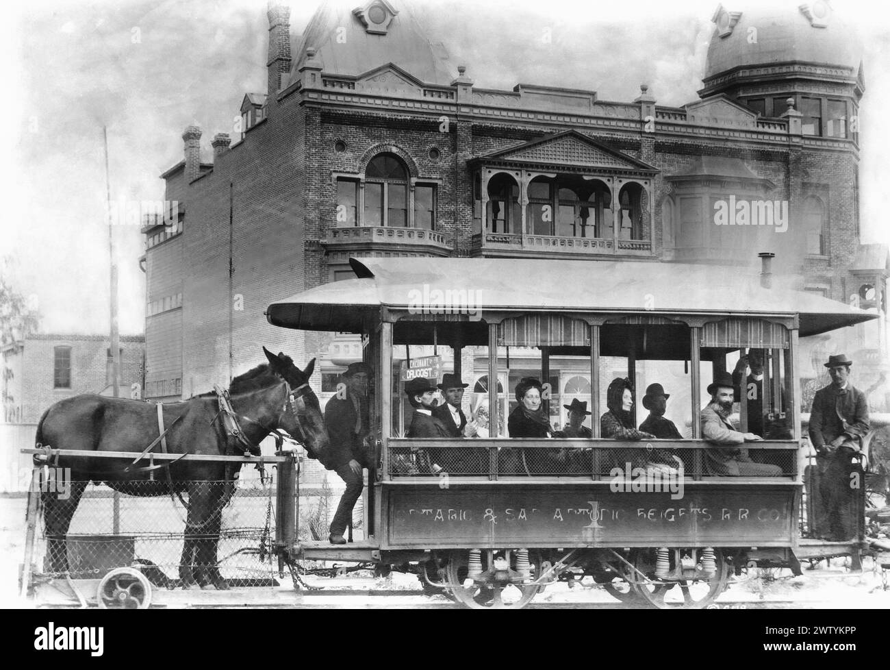 Image of a car of passengers sitting on the tracks on the Ontario Mule Car Line. Ontario & San Antonio Heights Railroad Company Stock Photo