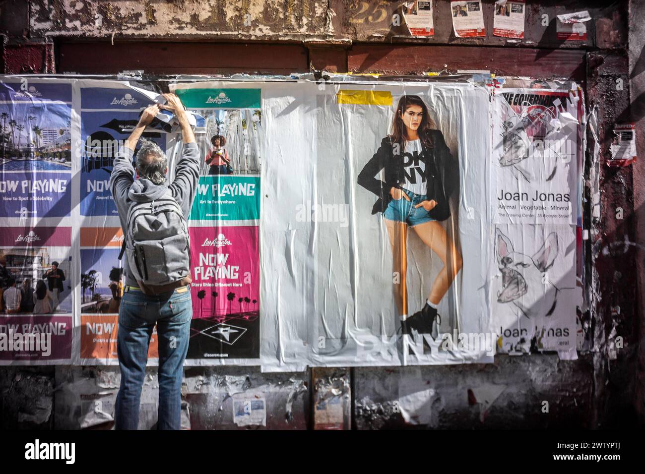 Wheatpasted billboard advertising short shorts from DKNY in Chelsea in New York on Saturday, March 16, 2024. According to fashion pundits short shorts are returning as a fashion trend in the Spring of 2024. (© Richard B. Levine) Stock Photo