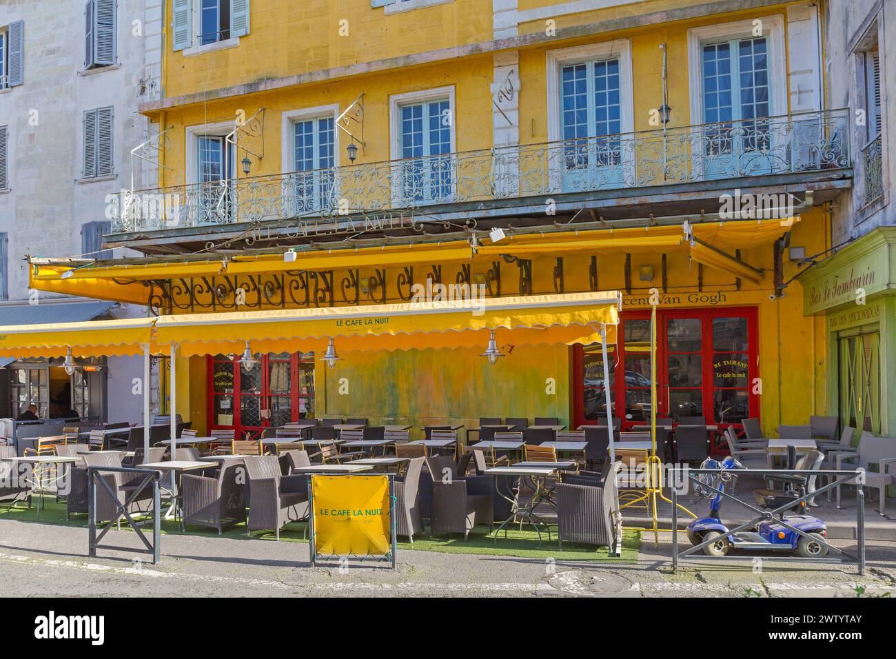 Arles, France - January 29, 2016: Famous Yellow Coffee Shop Le Cafe La Nuit Vincent Van Gogh at Place du Forum in Old Town. Stock Photo