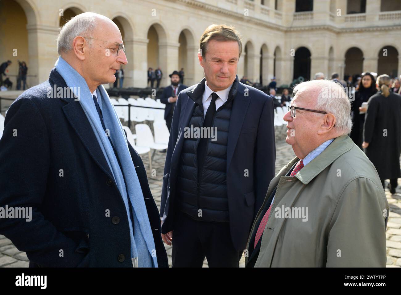 Paris, France. 20th Mar, 2024. Didier Miguaud, Nicolas Dupont Aignan and Jacques Myard during a 'national tribute' ceremony to late French politician and admiral, Philippe de Gaulle, the son of Charles de Gaulle, with his portrait displayed on a facade, at the Hotel des Invalides in Paris on March 20, 2024. Photo by Jacques Witt/Pool/ABACAPRESS.COM Credit: Abaca Press/Alamy Live News Stock Photo