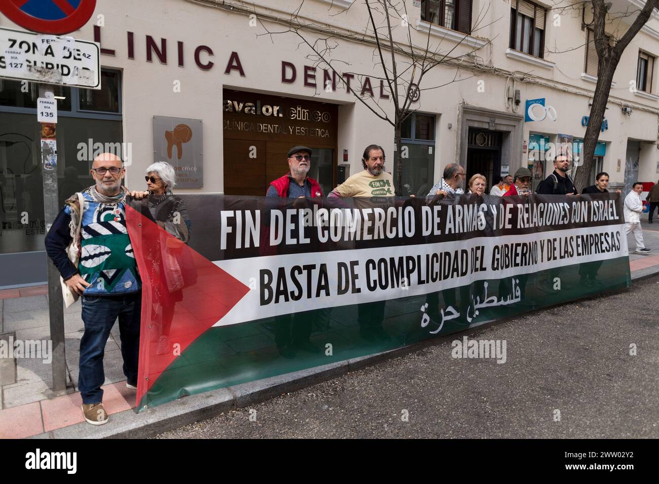 Pro-Palestine activists hold a banner during a demonstration in front of the headquarters of the PSOE (Spanish Socialist Workers Party), the official party of the Spanish government, in Madrid to demand an end to arms sales to Israel. Protesters from the Solidarity Network against the Occupation of Palestine in Spain delivered a petition demanding an end to the arms trade between Spain and Israel and a bouquet of black roses, addressed to Pedro Sanchez, President of the Government of Spain and general secretary of the PSOE (Party Spanish Socialist Workers). (Photo by Luis Soto/SOPA Images/Si Stock Photo