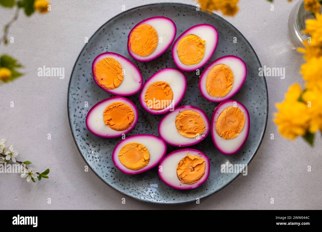 Hard boiled eggs pickled in beetroot juice Stock Photo Alamy
