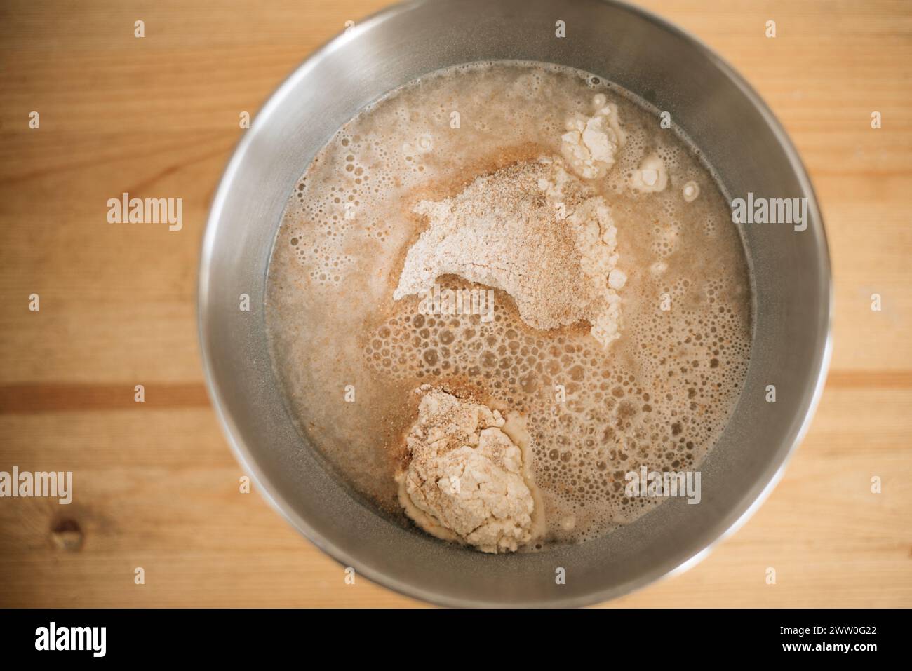 Pouring water bowl flour preparing hi-res stock photography and images ...