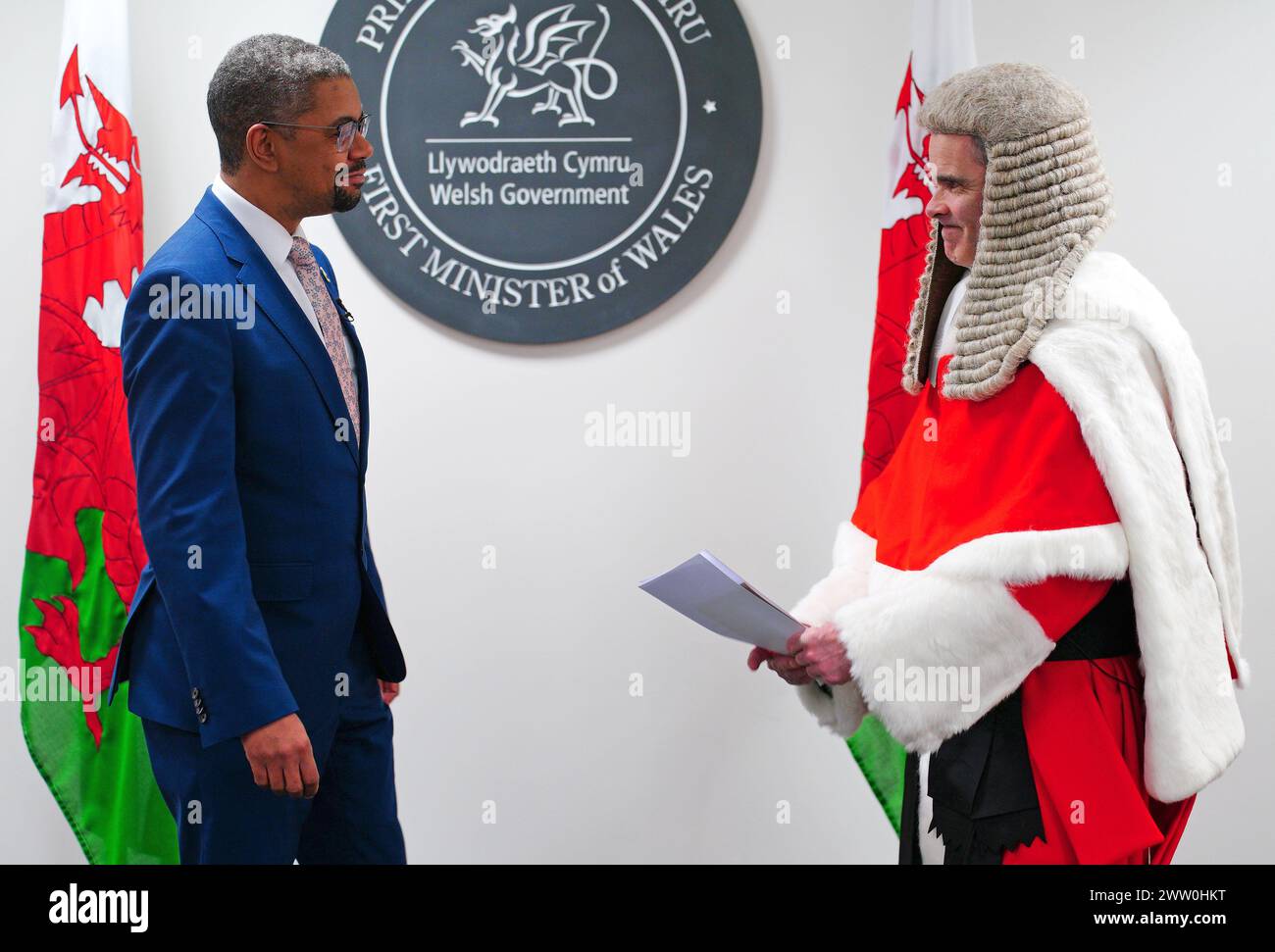 New First Minister of Wales Vaughan Gething with Justice Martin Griffiths, presiding judge of Wales, with his signed affirmation at the Senedd in Cardiff. Picture date: Wednesday March 20, 2024. Stock Photo