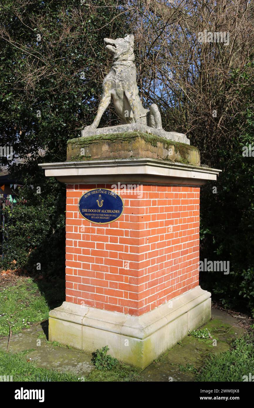 The Dogs of Alcibiades statue on brick plinth, Bow Heritage Trail, Bonner Bridge entrance to Victoria Park, London. Presented to park by Lady Regnart. Stock Photo