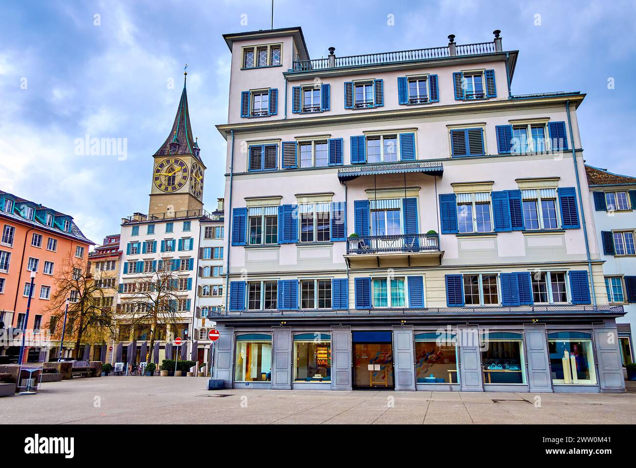 Weinplatz square with scenic old houses and the bell tower of Peterskirche above the roofs, Zurich, Switzerland Stock Photo
