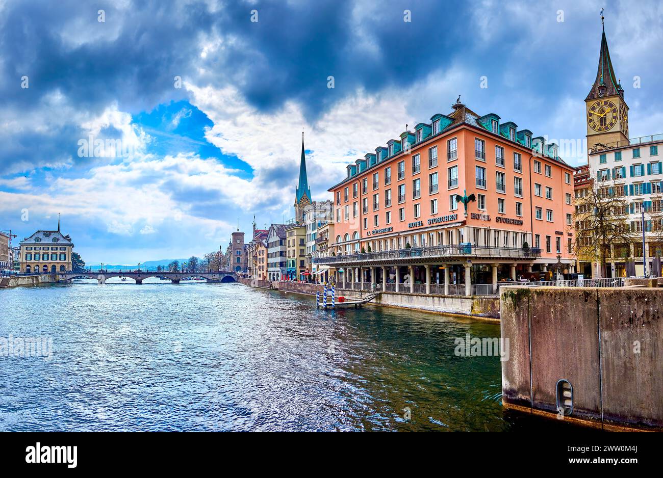 ZURICH, SWITZERLAND - APRIL 3, 2022: Great ensemble of the riverside houses with old Hotel Storchen, on April 3 in Zurich, Switzerland Stock Photo