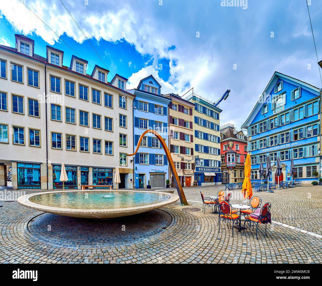 ZURICH, SWITZERLAND - APRIL 3, 2022: Munsterhof Brunnen, the fountain amidst Munsterhof's historic townhouses, on April 3 in Zurich, Switzerland Stock Photo